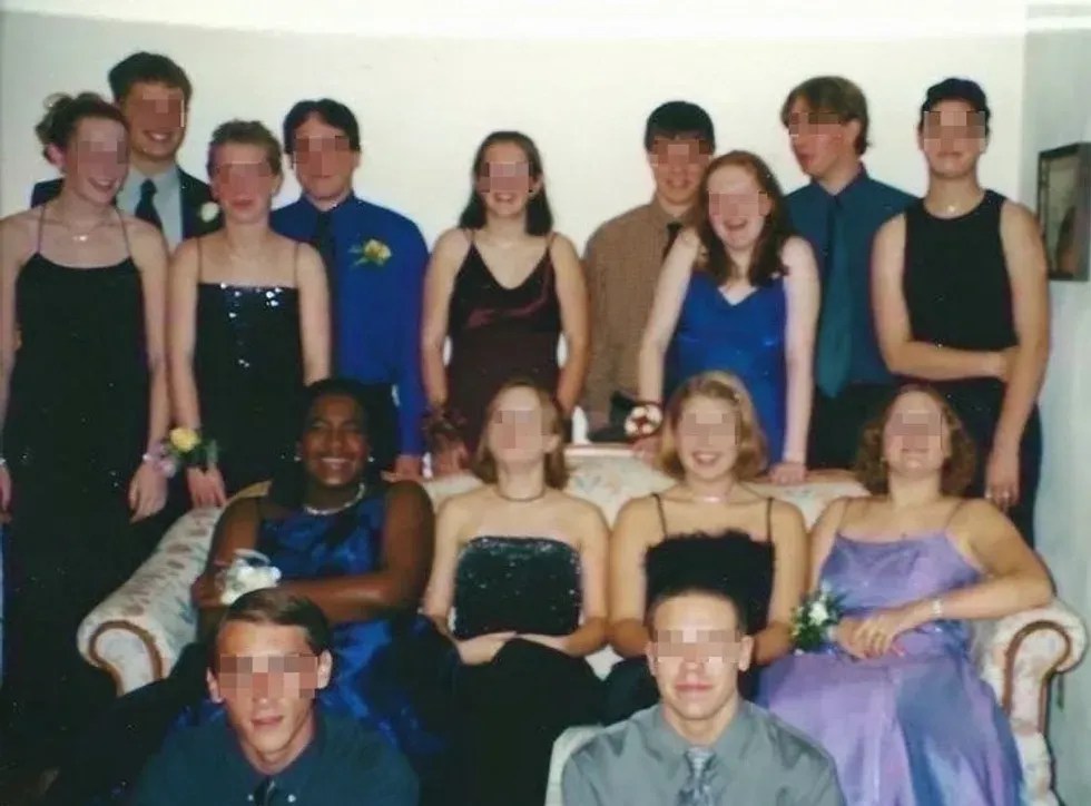 group of teens taking a photo before a dance. all eyes are pixelated except the author's