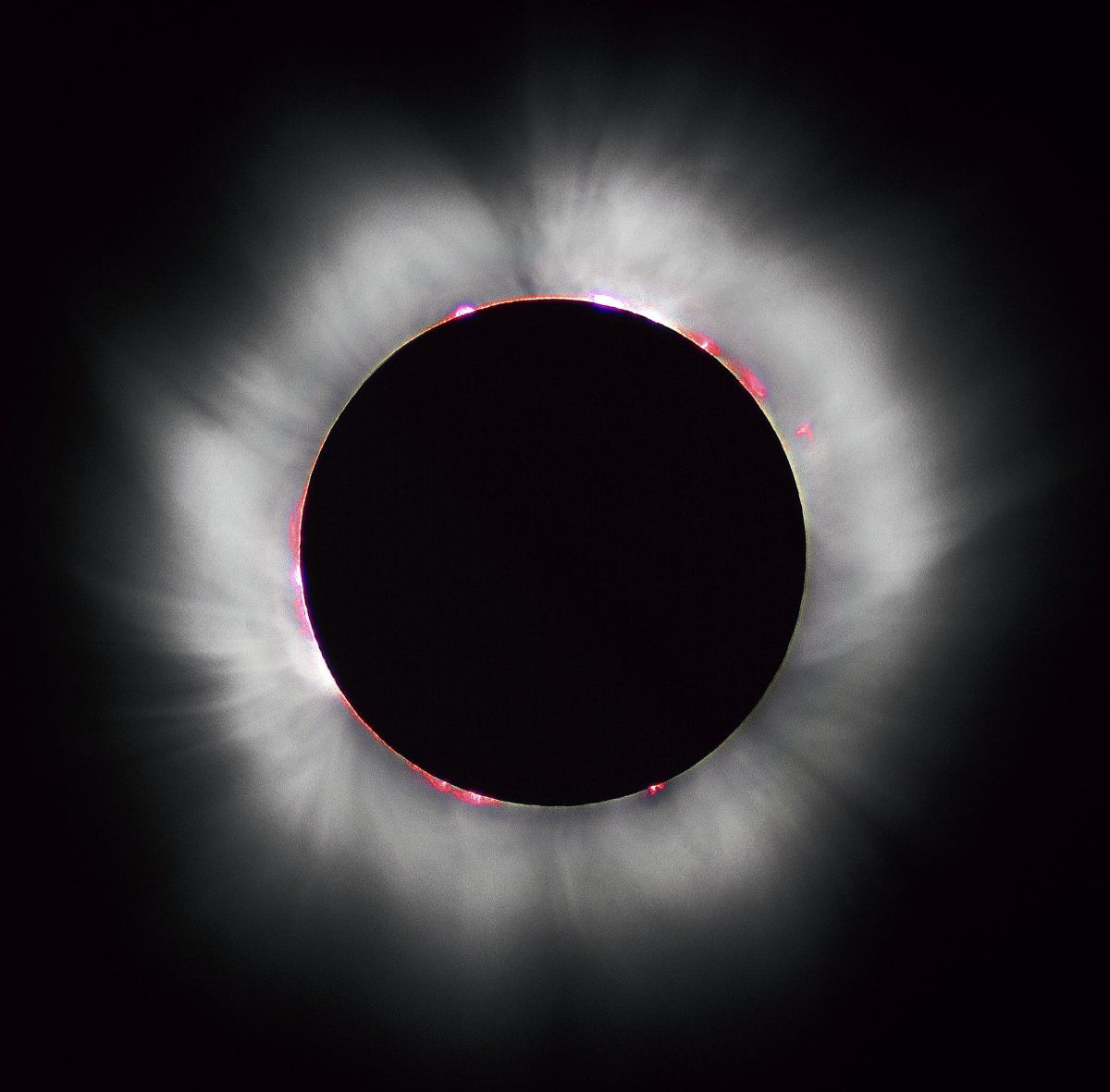 A black and white photo of a solar eclipse
