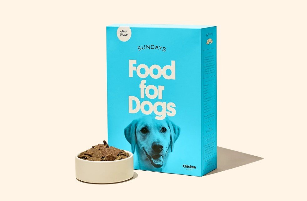 Bright blue dog food box labeled