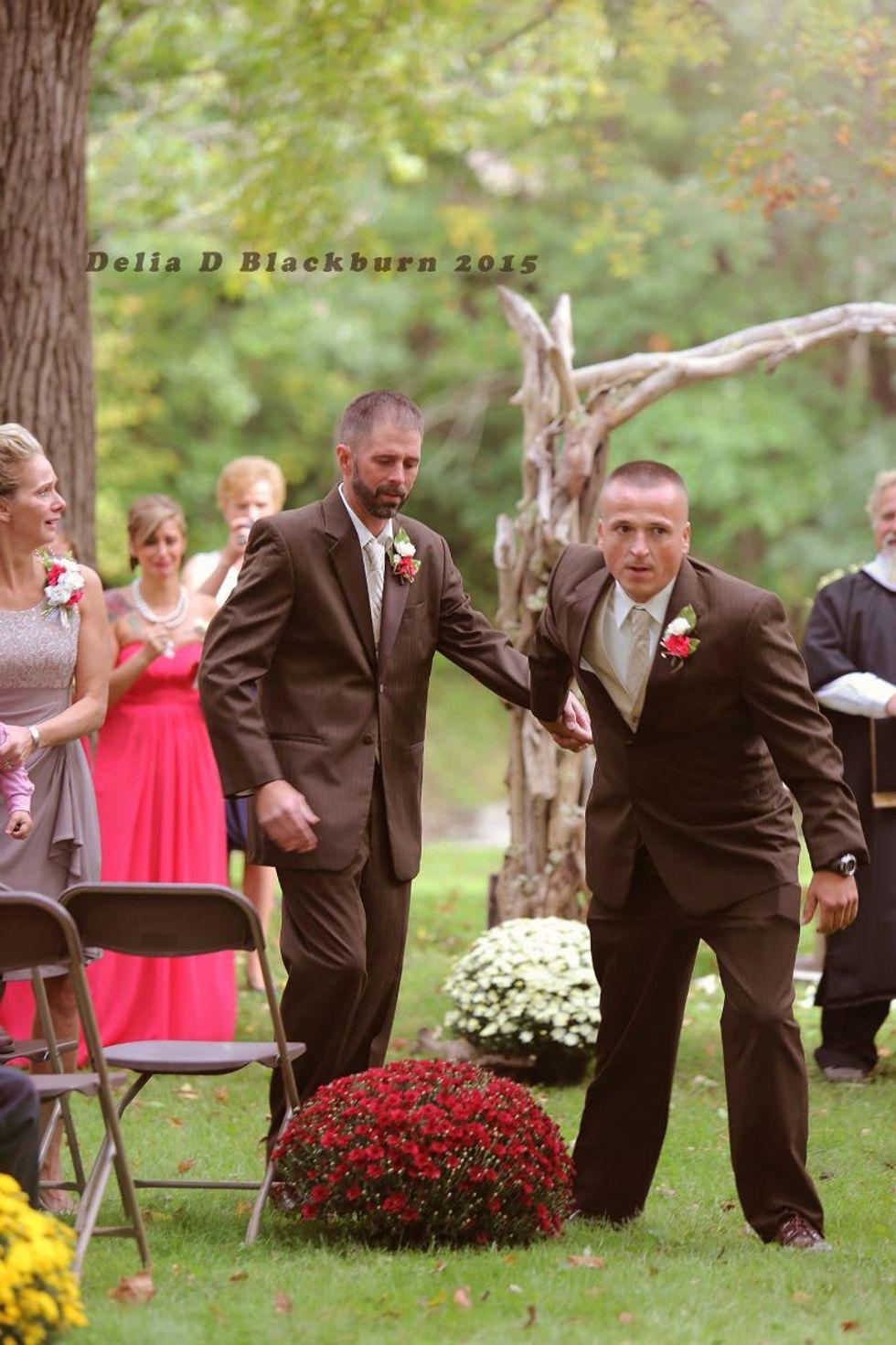 two men in tuxedos at a wedding