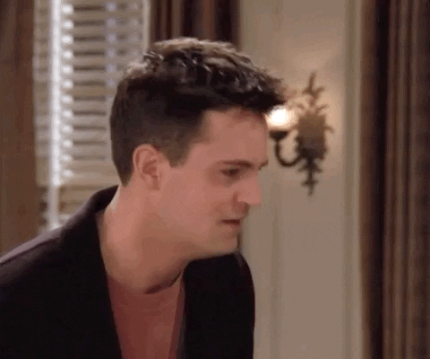 gif of man looking at aquarium