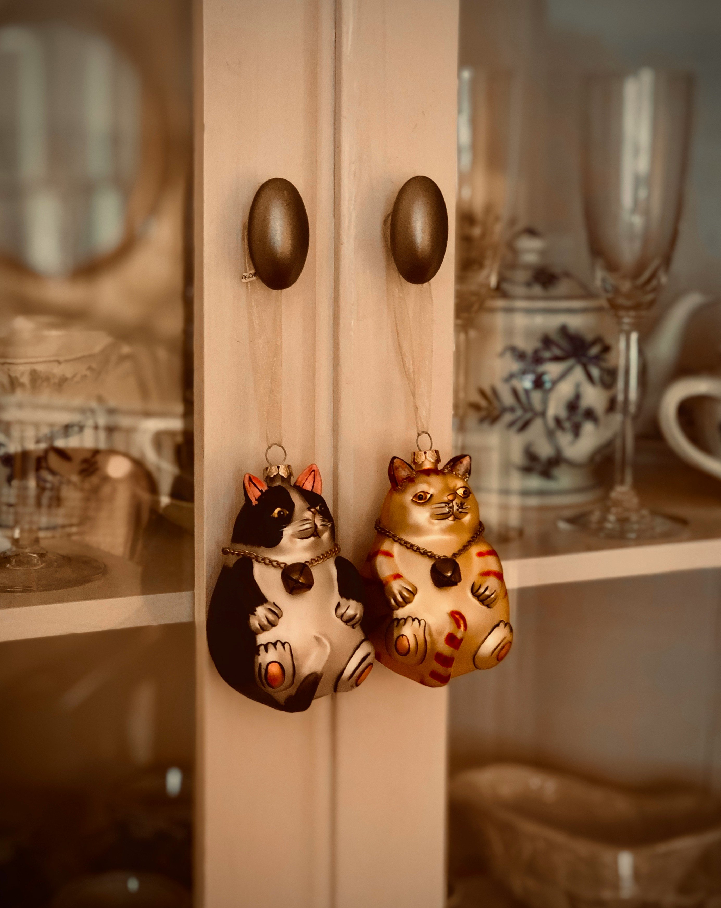 cat decorations hanging on a door