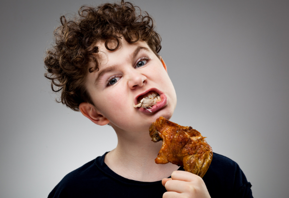young boy, chicken, chicken leg, baked chicken, chicken bone,