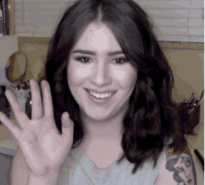 gif of woman waving