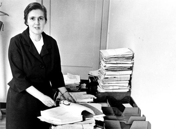 black and white photos of Frances Oldham Kelsey in her office