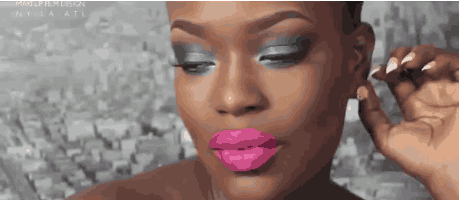 woman with bright pink lipstick