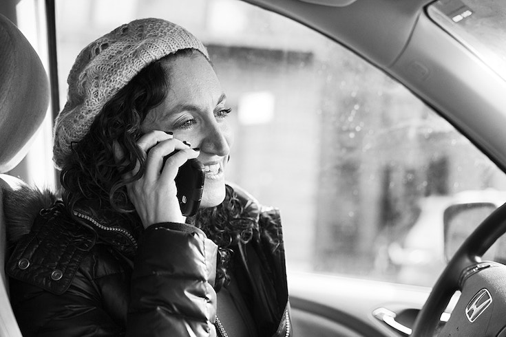 Woman smiling on the phone