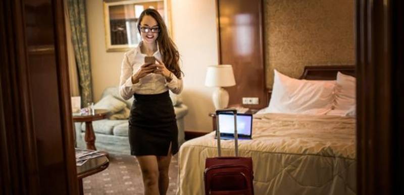 hotel, hotel upgrade, traveler, luggage, woman in hotel