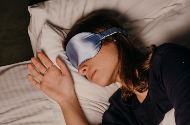 woamn sleeping, sleep, sleep mask, bed, 