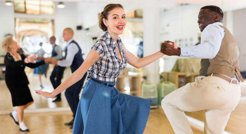 couple dancing, retro dancing, swing dancing, dance studio, dance lessons,