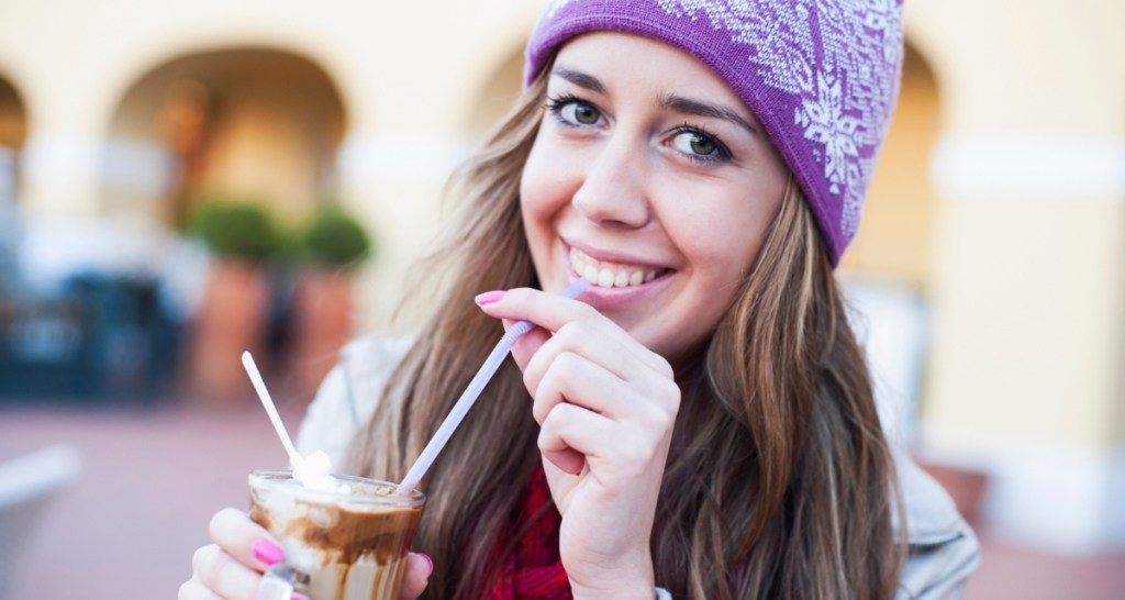 woman drinking a latte, coffee, iced coffee