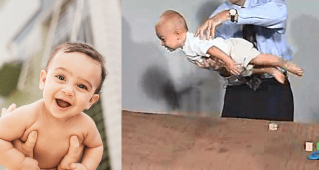 baby, doctor, landau reflex, held, smile
