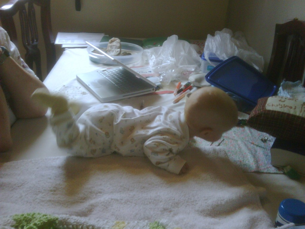 baby, tummy time, landau reflex, blanket, onesie
