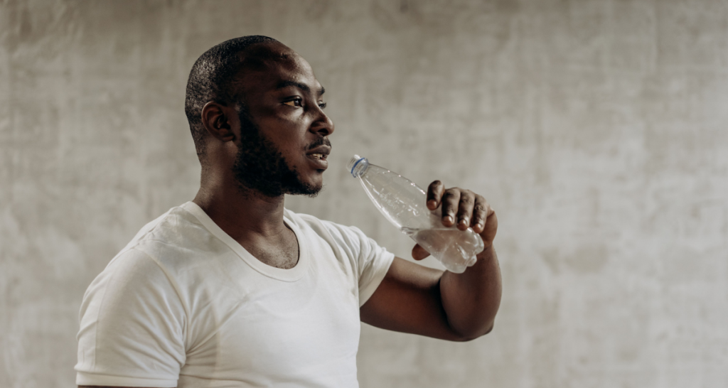 bottled water, white t-shirt, beard, sweaty, hot day