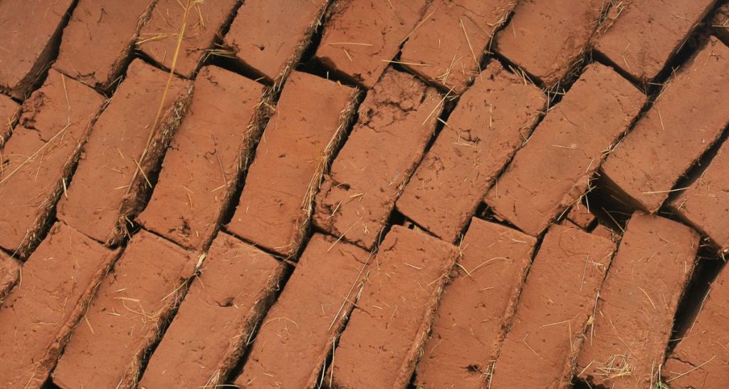 Adobe houses can last thousands of years and barely cost anything to make. Here’s why they’re banned.