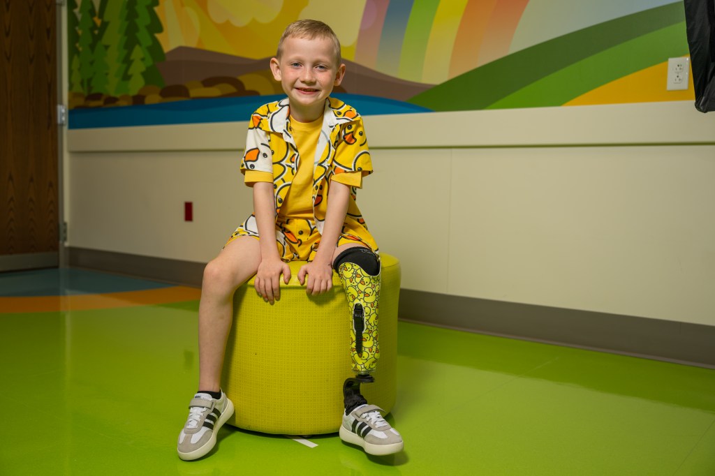 Arlo with his prosthetic covered in ducks at Shriners Children's.