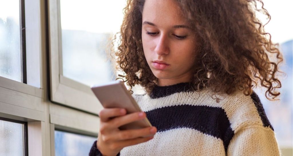 gen z, texting, girl holding phone