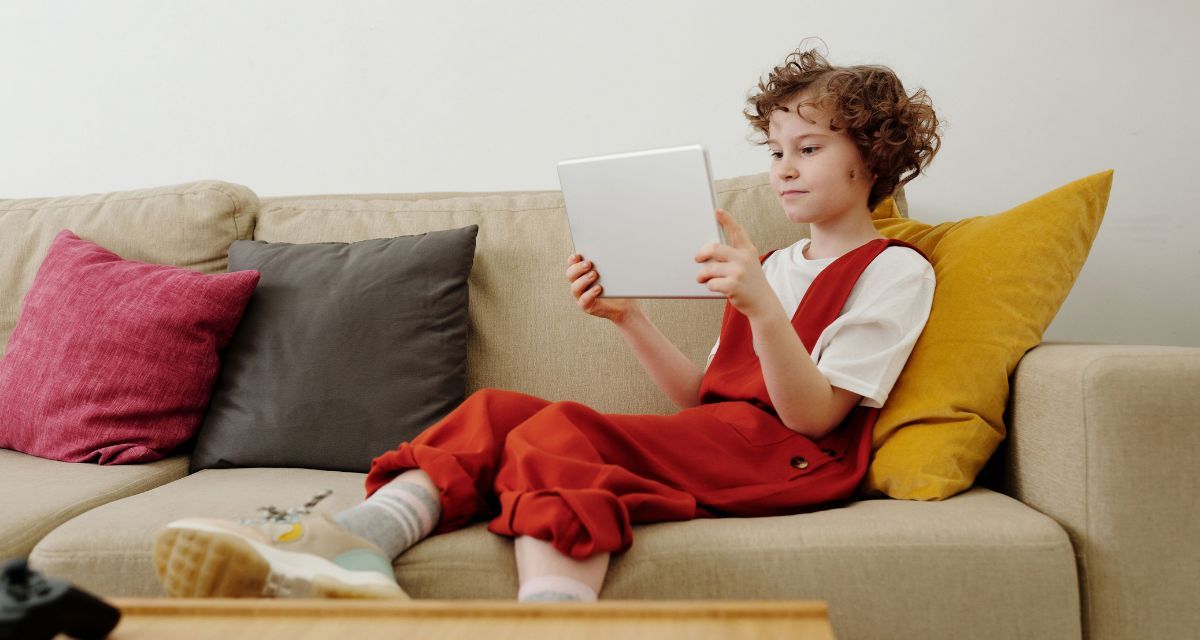 kid, couch, headphones, tablet, screen time
