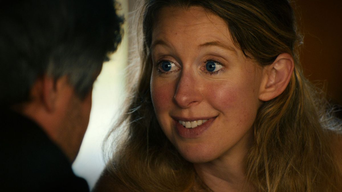 man, woman, stare, smile, Elizabeth Holmes