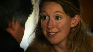 man, woman, stare, smile, Elizabeth Holmes