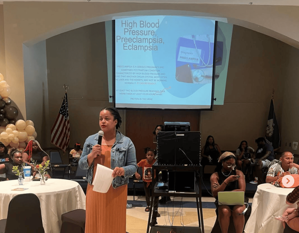 Frankie Robertson at the Joyful Birth Advocacy session with expectant moms, partners, and families at the Community Baby Shower