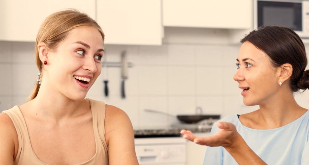women in kitchen, women talking, women laughing