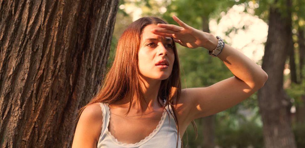 lost woman, woman in forest, hand on forehead