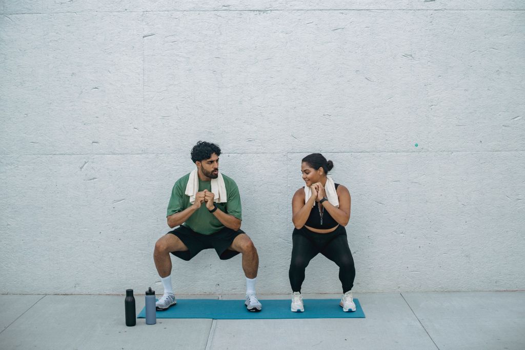 man, woman, wall, yoga mat, working out