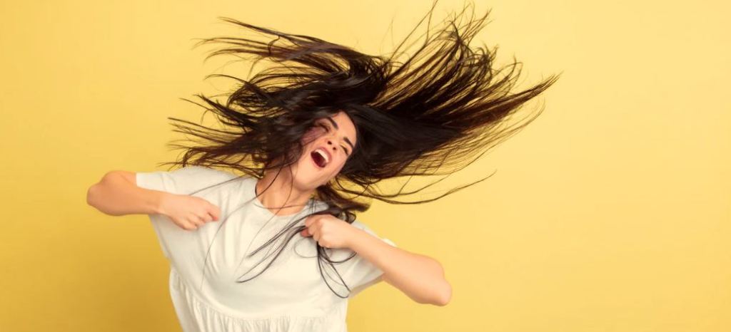 woman dancing, woman in 20s, crazy hair